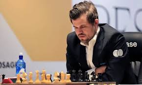 Chess champion Magnus Carlsen returns to compete after wardrobe controversy